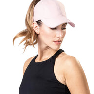 Performance 2.0 Ponytail Cap by Top Knot in pale pink, breathable headwear designed for women’s running and outdoor comfort