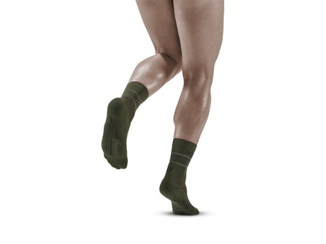 Reflective Mid Cut Socks - Men by CEP Sports in dark green with 360-degree reflective yarn and compression for running visibility and support