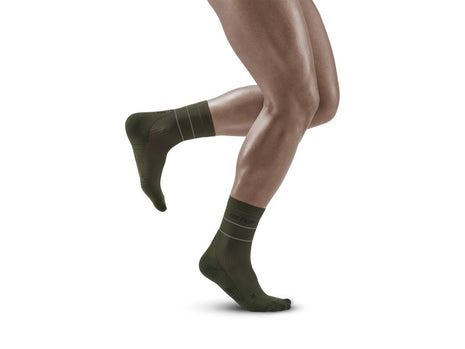 Reflective Mid Cut Socks - Men by CEP Sports in dark green with 360-degree reflective yarn and medi compression for running safety and support