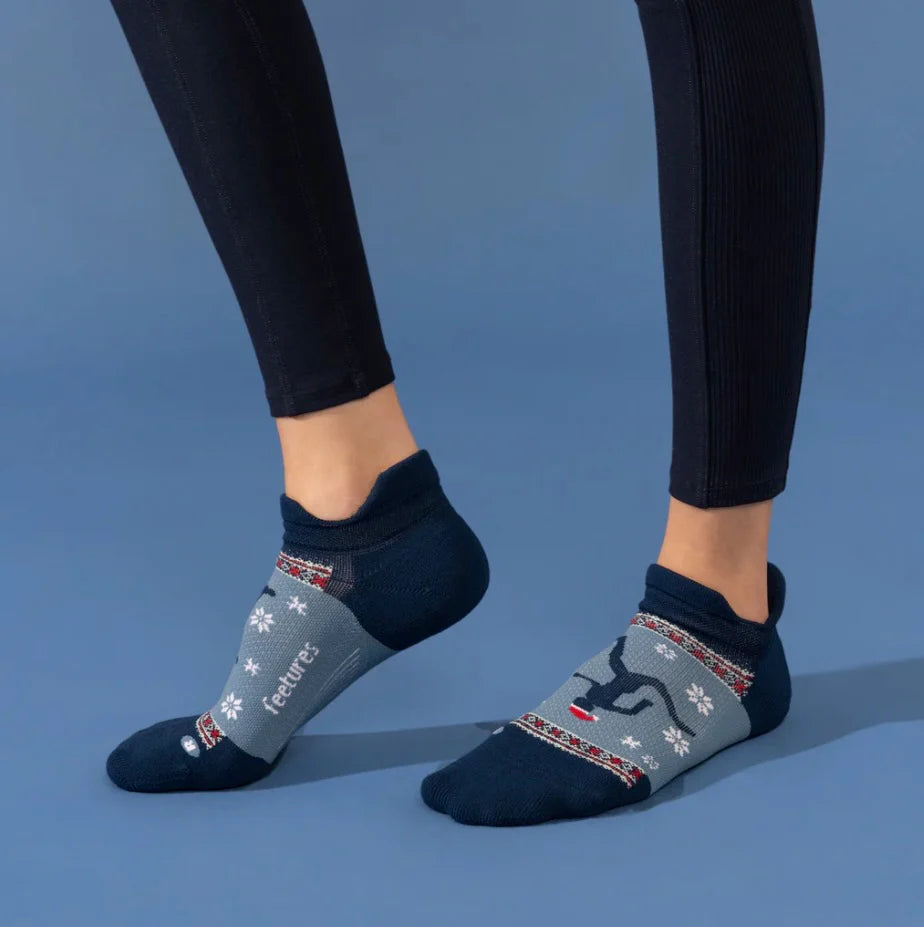 Elite Light Cushion No Show Tab by Feetures in navy and grey with anatomical design and targeted compression for running and long-distance use