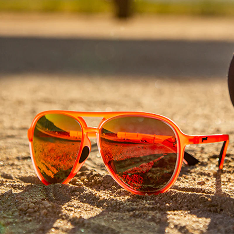 Captain Blunt's Red-Eye by Goodr in red aviator style sunglasses with no slip, no bounce, designed for bigger noggins and late flights outdoors.