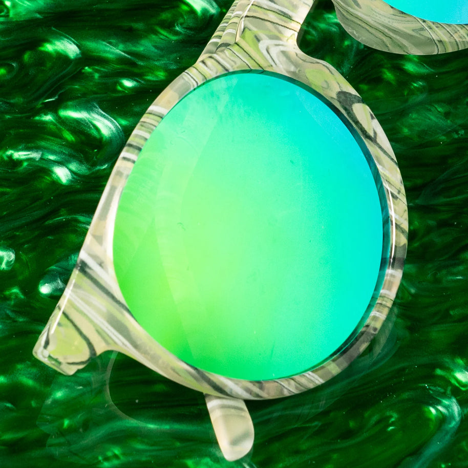 Marble Arts Master by Goodr with glossy green translucent marble frames and green reflective polarized lenses for no-slip outdoor use