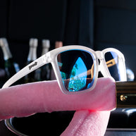 Middle Seat Advantage by Goodr in white with mirrored reflective lenses, slim fit for smaller faces, ideal for running and outdoor use