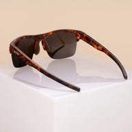 Country Club Crasher by Goodr in brown tortoiseshell with half-rim wrap frame and adjustable nose piece for stylish outdoor use