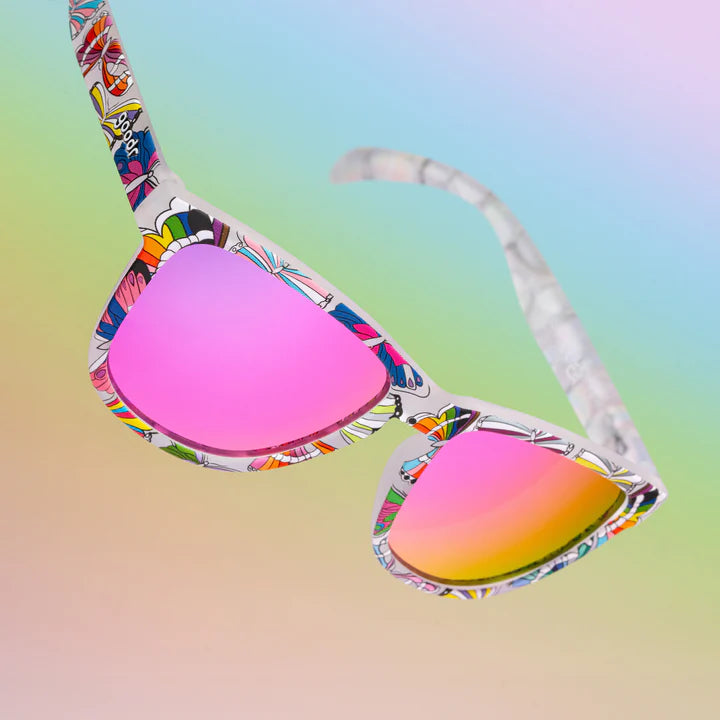 Is It Queer In Here Or Is It Just Us?! by Goodr, clear frames with colorful butterflies, purple mirrored lenses, pride-inspired sunglasses