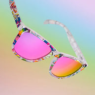 Is It Queer In Here Or Is It Just Us?! by Goodr, clear frames with colorful butterflies, purple mirrored lenses, pride-inspired sunglasses
