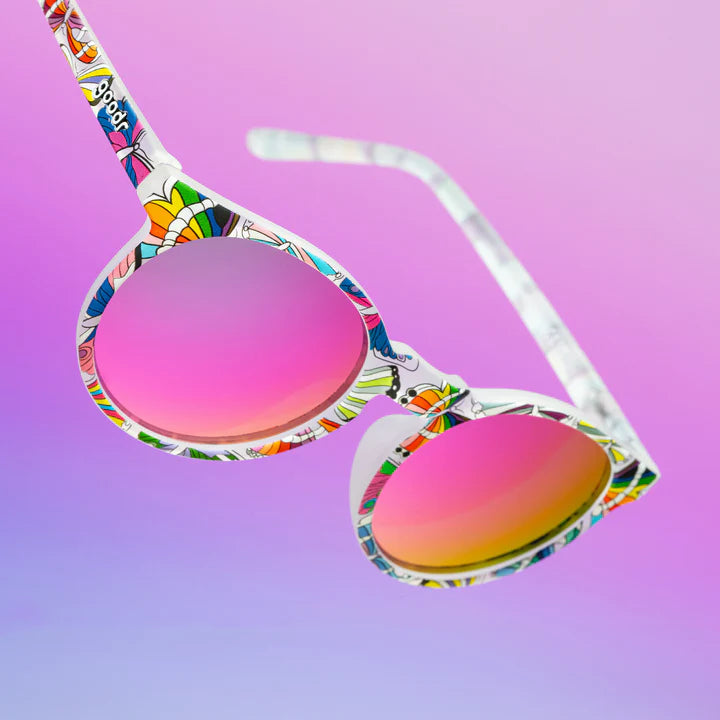 Not A Phase, A Transformation by Goodr, clear glasses with purple lenses and colorful butterfly LGBTQ+ flag design, unisex eyewear