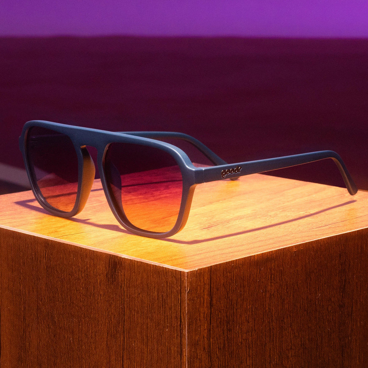 Deja Vu Daydream by Goodr dark blue square aviators with purple gradient lenses ideal for stylish outdoor use