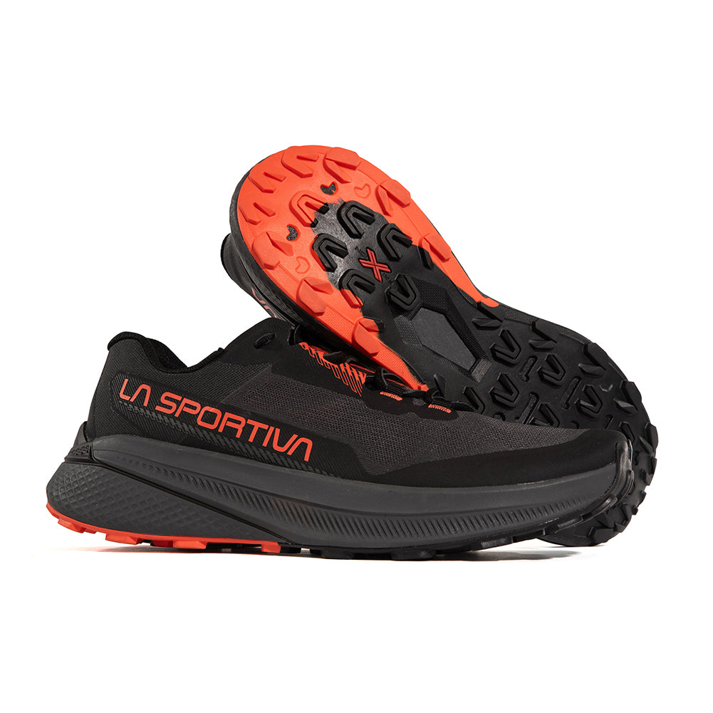 Prodigio - Men by La Sportiva in black and orange with XFlow™ foam, lightweight trail running shoes for cushioning and stability on rugged paths