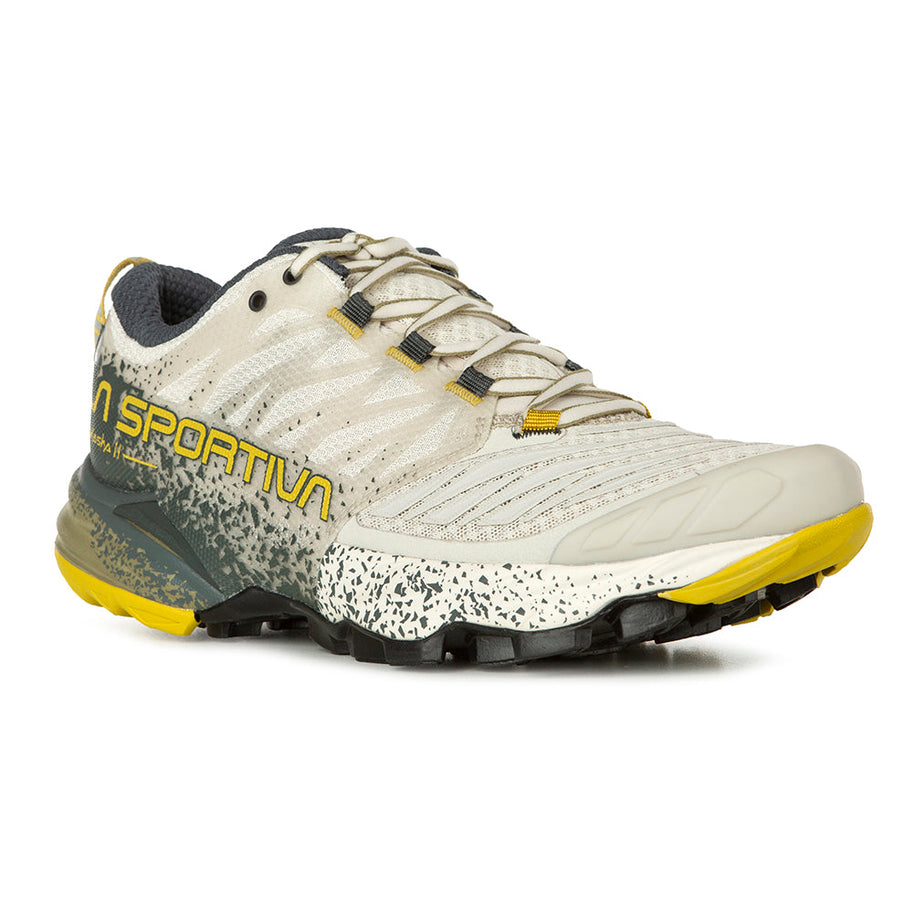 Akasha II - Women by La Sportiva in beige and yellow, cushioned responsive trail running shoe with outsole traction for technical terrain and high mileage
