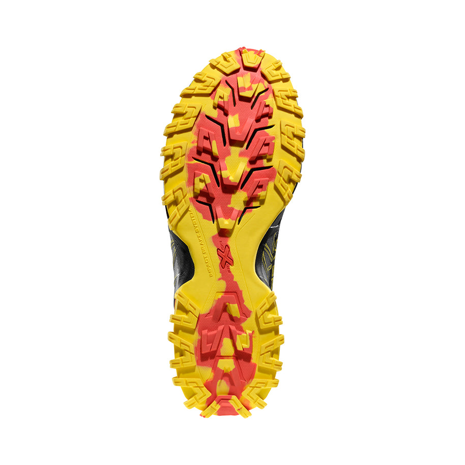 Bushido III - Men by La Sportiva in black and yellow with rugged outsole for technical trail running and mountain terrain stability