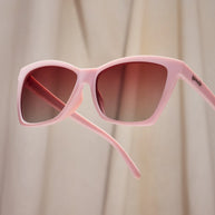 Rosé Retail Therapy by Goodr in light pink with rose ocean gradie lenses, lightweight sunglasses perfect for stylish outdoor use
