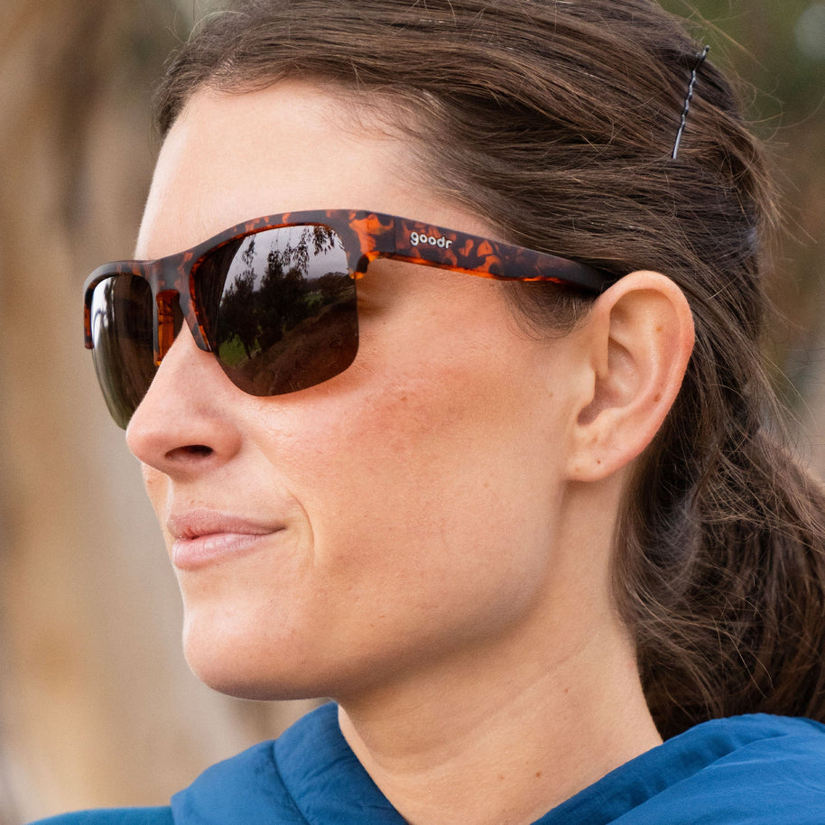 Country Club Crasher by Goodr in brown tortoiseshell with half-rim wrap frame and adjustable nose piece for stylish outdoor use