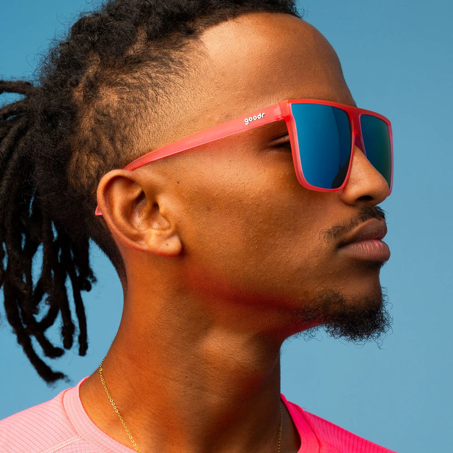 Entourage Sold Separately by Goodr in translucent hot pink with teal reflective lenses, stylish sunglasses for bold outdoor looks