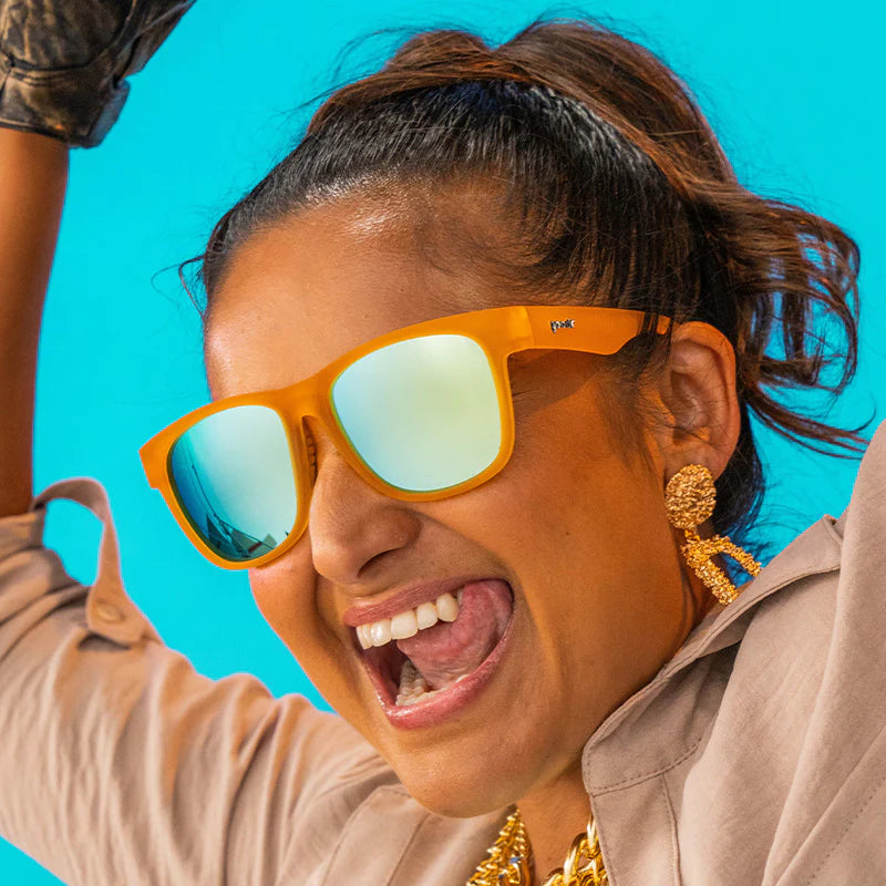 Gold Digging With Sasquatch by Goodr in bright orange with reflective lenses, lightweight stylish glasses for casual outdoor use