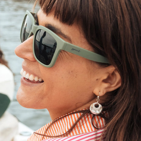 Lazy River Royalty by Goodr in dark green Tidal G frames with green water-repellent lenses, floating sunglasses for pool and water use