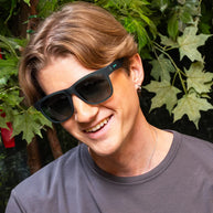 Underwater Thunder Plunder by Goodr, teal translucent frames with green gradient lenses, stylish no-slip sunglasses for outdoor use