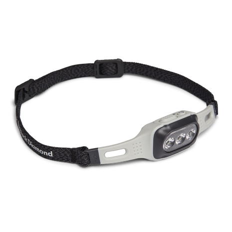 Deploy Run Headlamp by Black Diamond in white and black with 325-lumen output, adjustable lens, ideal for running and safety use.