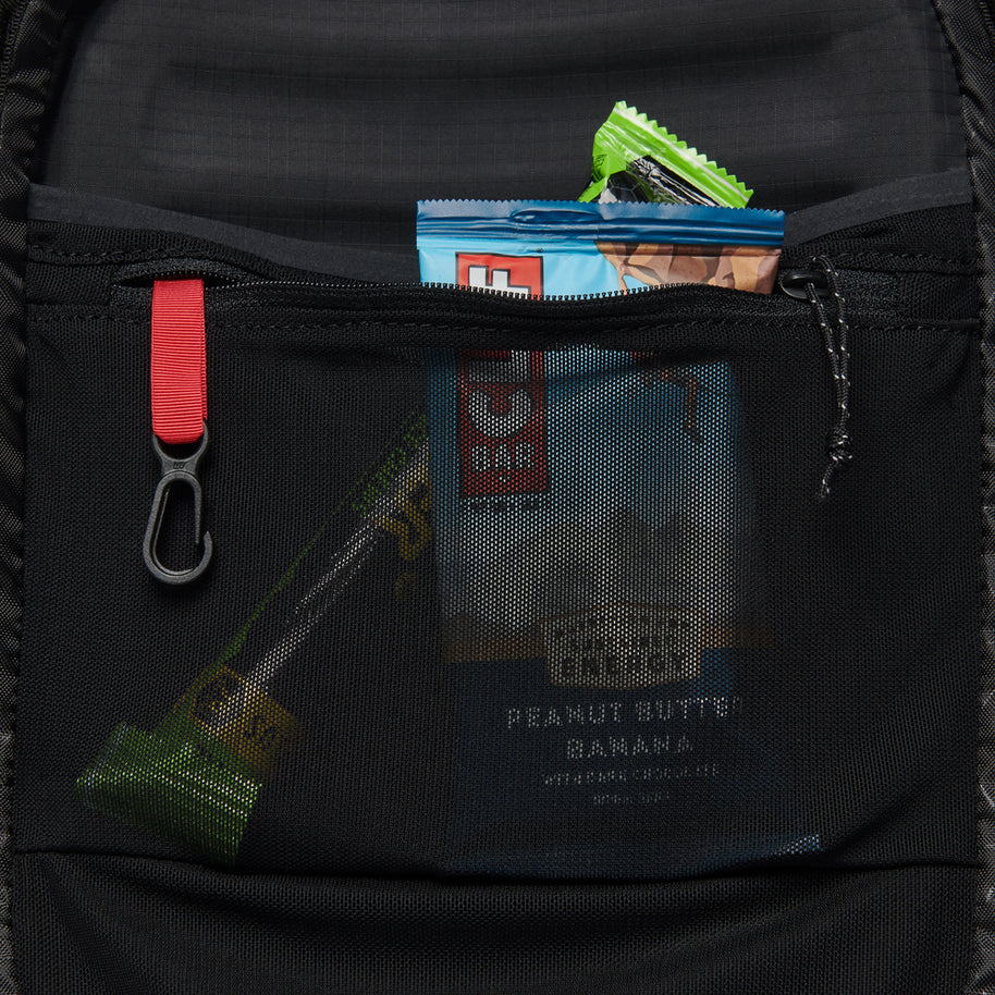 Distance 15 Backpack - Women (Prior Season) by Black Diamond in black with mesh pocket, hybrid design for alpine running and scrambling days