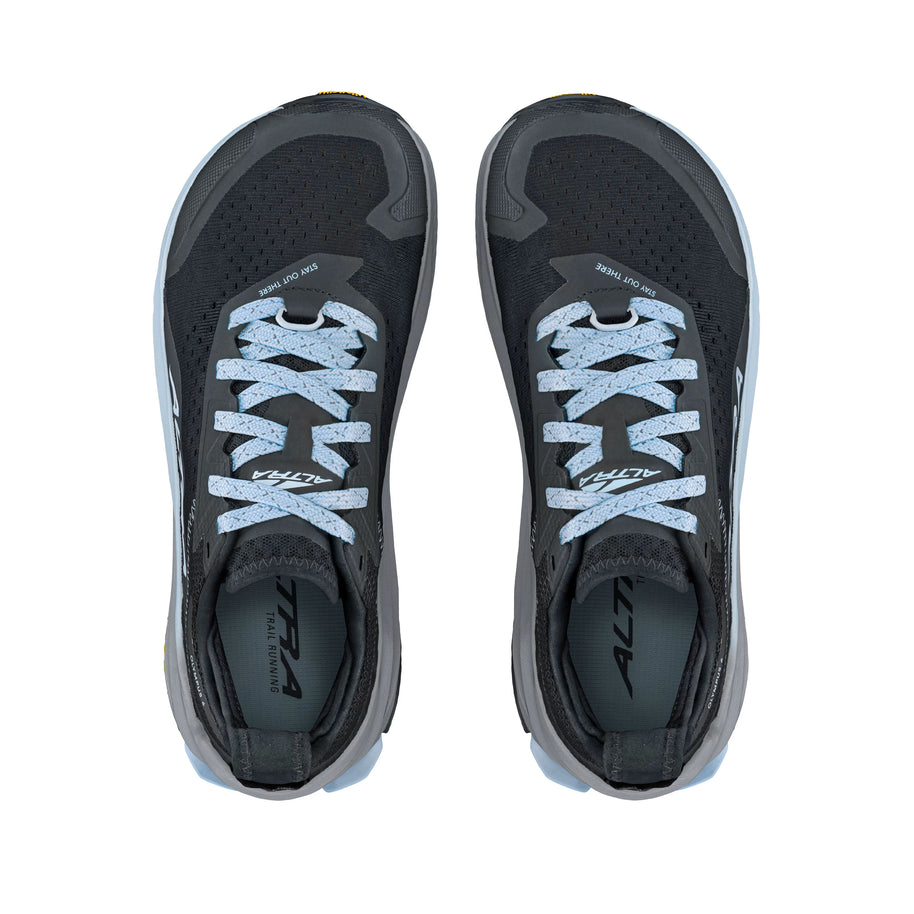 Olympus 6 - Women by Altra Footwear in black and light blue plush trail runners with cushion, grip, and roomy toe box for all-day comfort and trail use