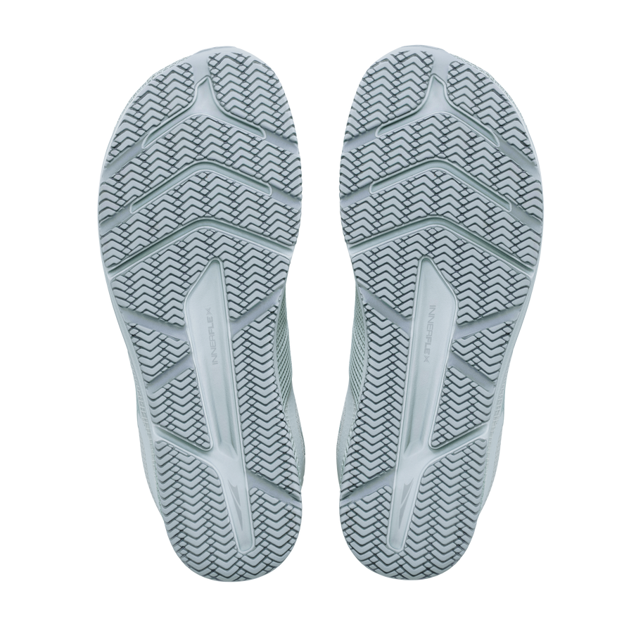 Pair of Altra Solstice XT 3 men's training shoes in High Tide/High Tide/Tradewinds, outsole view of grey herringbone tread