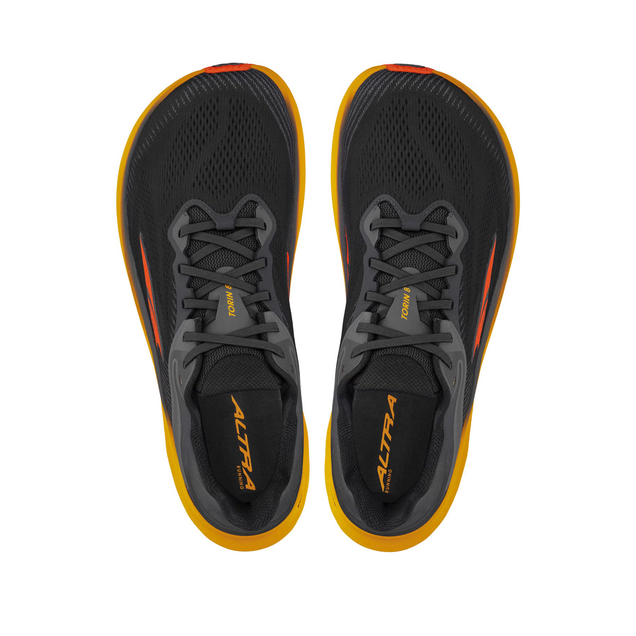 Torin 8 - Men by Altra Footwear in black and orange, zero drop road running shoes with roomy toe box and soft underfoot comfort