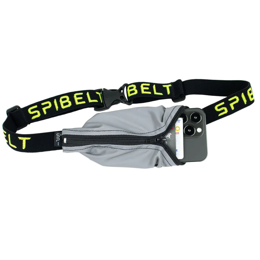 Reflective Running Belt by SPIbelt in grey with black and yellow adjustable strap, large pocket and reflective logo for safety while running outdoors