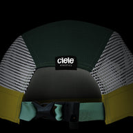 ALZCap Trail - Mountain Cut by Ciele in green and yellow with structured COOLmatic PLUS mesh for cooling and odour protection, ideal for running outdoors