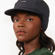 FLTCap WND - Ultra Iconic by Ciele in black with fold-away ear flaps, cold weather headwear for running and outdoor use in Canada