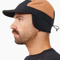 FLTCap WND - Ultra Iconic by Ciele in black and tan with fold-away ear flaps for cold weather running and outdoor protection