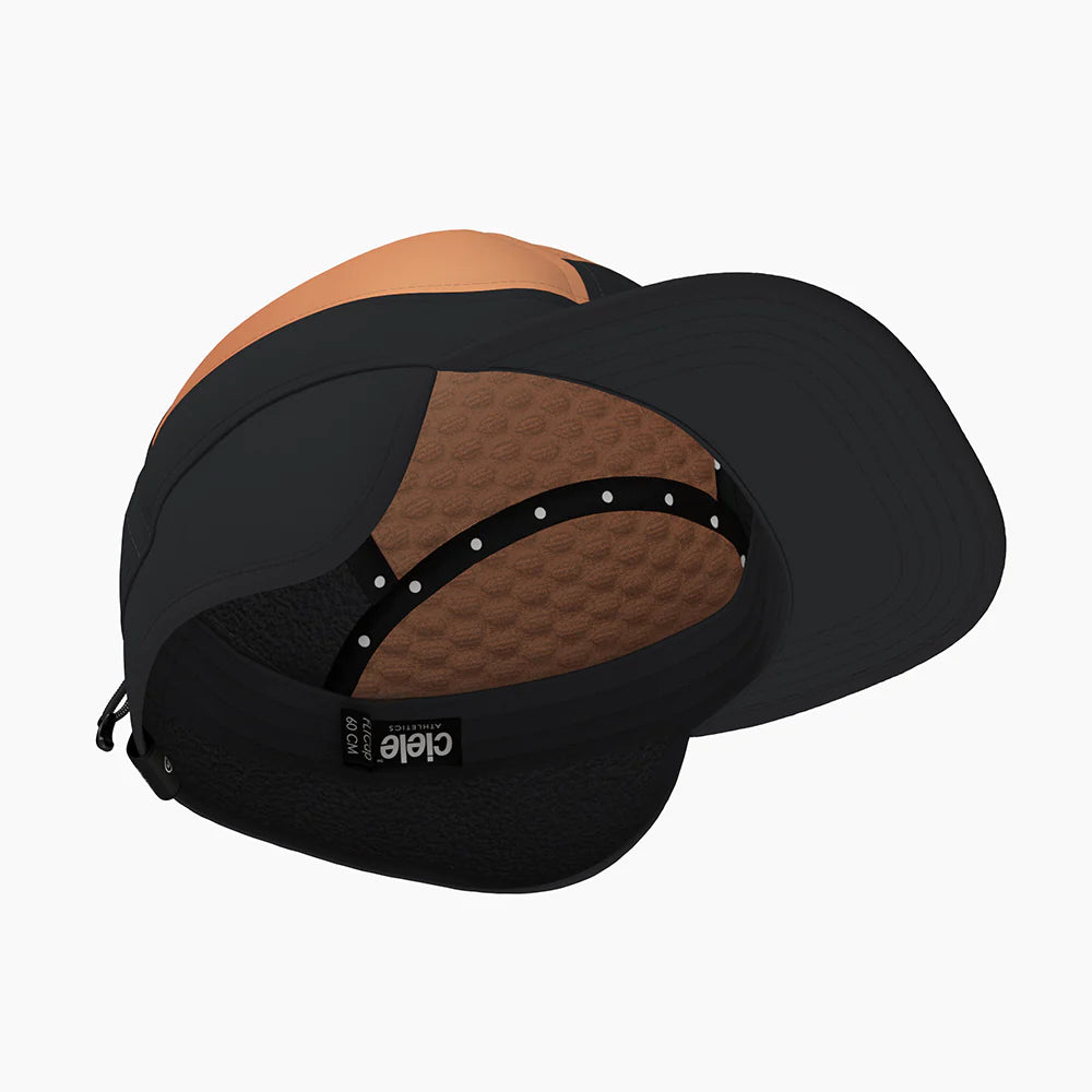FLTCap WND - Ultra Iconic by Ciele in black and brown with fold-away ear flaps, cold weather running headwear from Canada