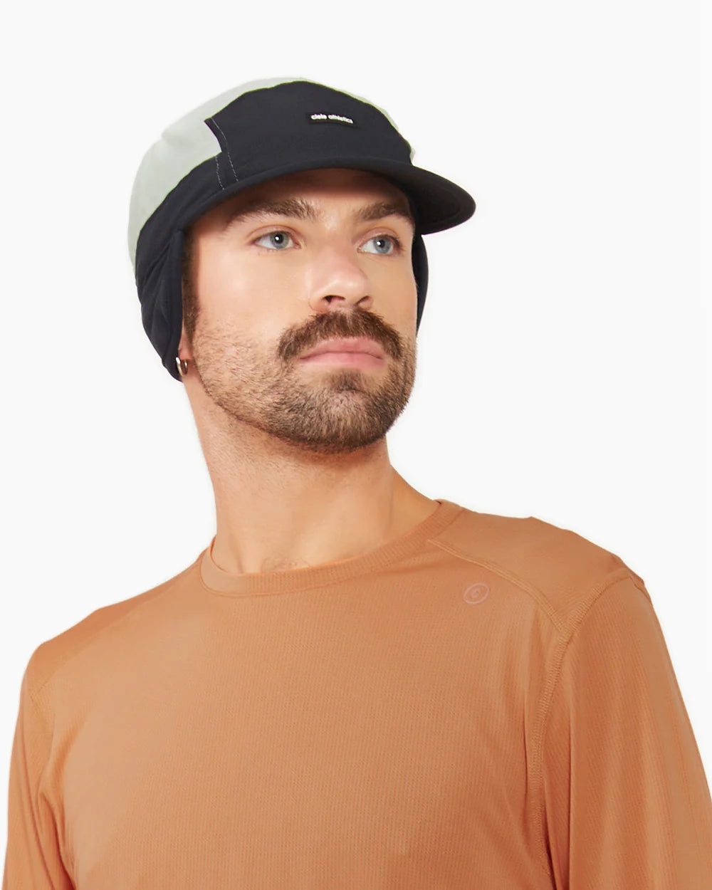 FLTCap WND - Ultra Iconic by Ciele in black and grey with fold-away ear flaps for cold weather running and outdoor use in Canada