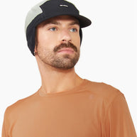 FLTCap WND - Ultra Iconic by Ciele in black and grey with fold-away ear flaps for cold weather running and outdoor use in Canada
