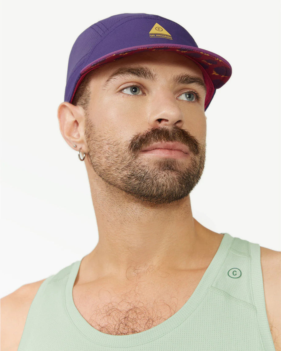 FSTCap 2 - Run Mountains SM by Ciele in purple and red, low-profile running cap with cycling-inspired brim ideal for trail running