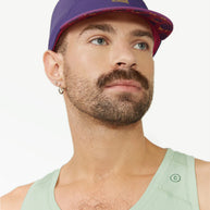 FSTCap 2 - Run Mountains SM by Ciele in purple and red, low-profile running cap with cycling-inspired brim ideal for trail running