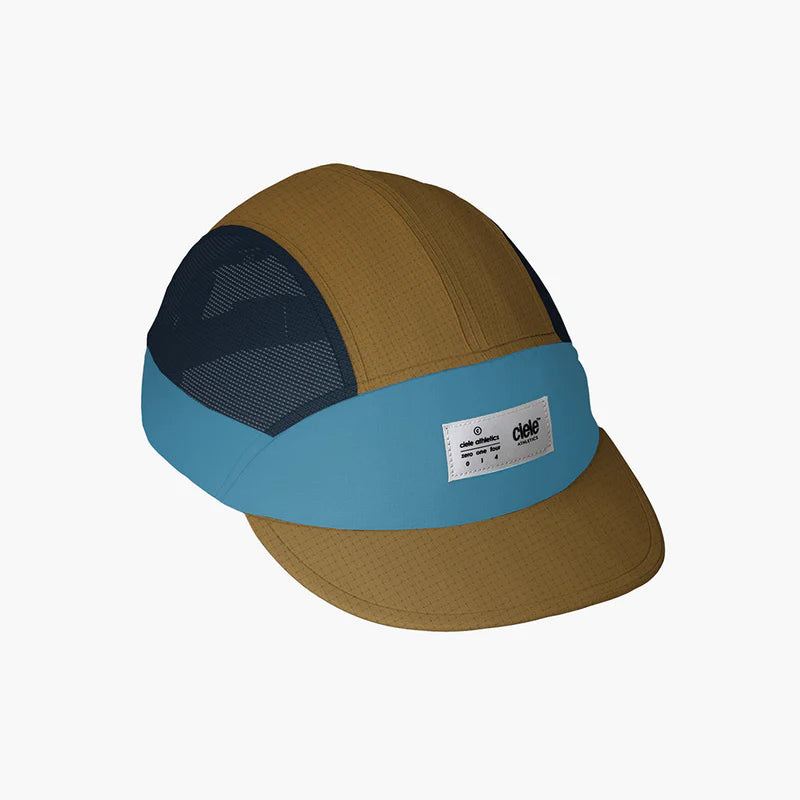 FSTCap SC - ZOF by Ciele in brown, blue, and black lightweight cycling-inspired cap with breathable mesh panels for running and outdoor use