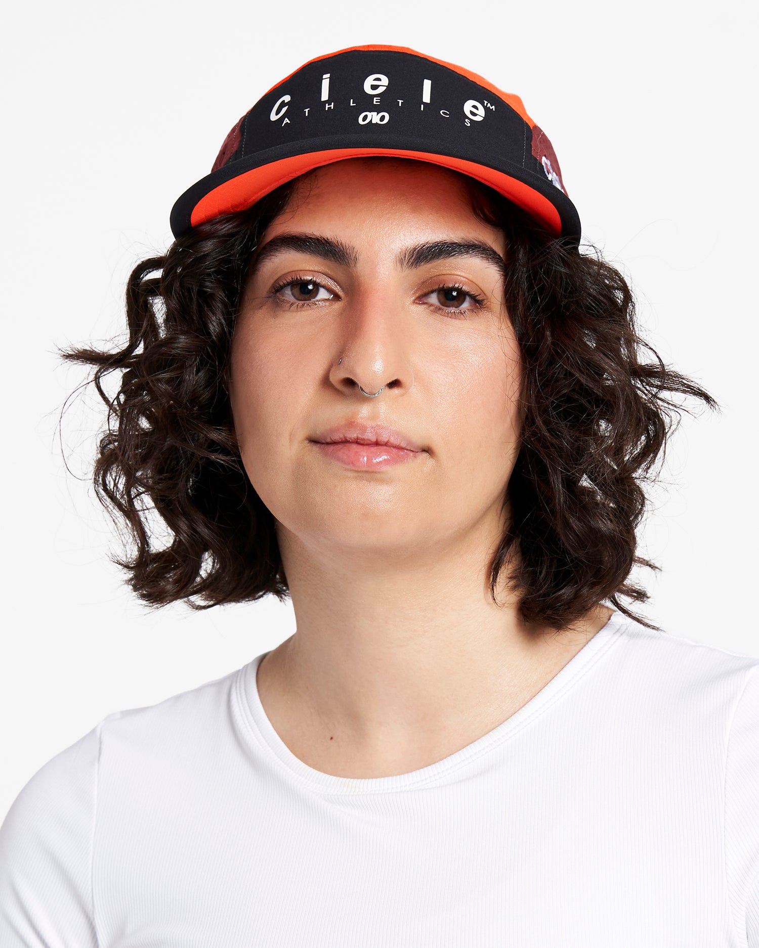 GOCap SC - Decade by Ciele in black and orange with SOFTcurve brim for long-distance comfort and sun protection, ideal for running and outdoor use