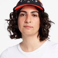 GOCap SC - Decade by Ciele in black and orange with SOFTcurve brim for long-distance comfort and sun protection, ideal for running and outdoor use