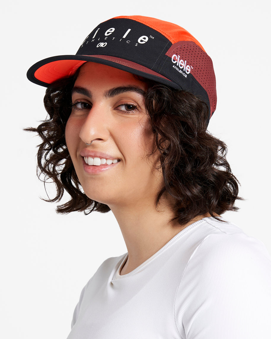 GOCap SC - Decade by Ciele in black and orange with SOFTcurve pre-curved brim for long-distance running comfort and sun protection