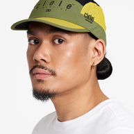 GOCap SC - Decade by Ciele in olive green and yellow with SOFTcurve brim, breathable running cap designed for long-distance comfort and protection