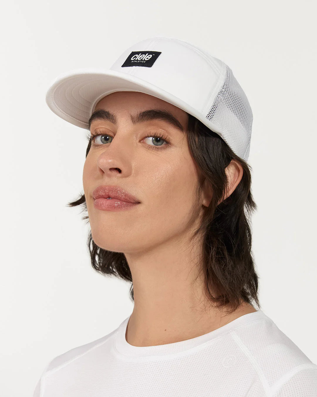 TRKCap SC - Box by Ciele in white technical trucker cap with curved brim, pinched crown, COOLmatic 3D mesh for running and outdoor use