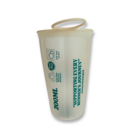 Foveo Collapsible Cup by Foveo Running in translucent beige, soft, BPA free, dishwasher safe, made with recycled materials for runners in Canada