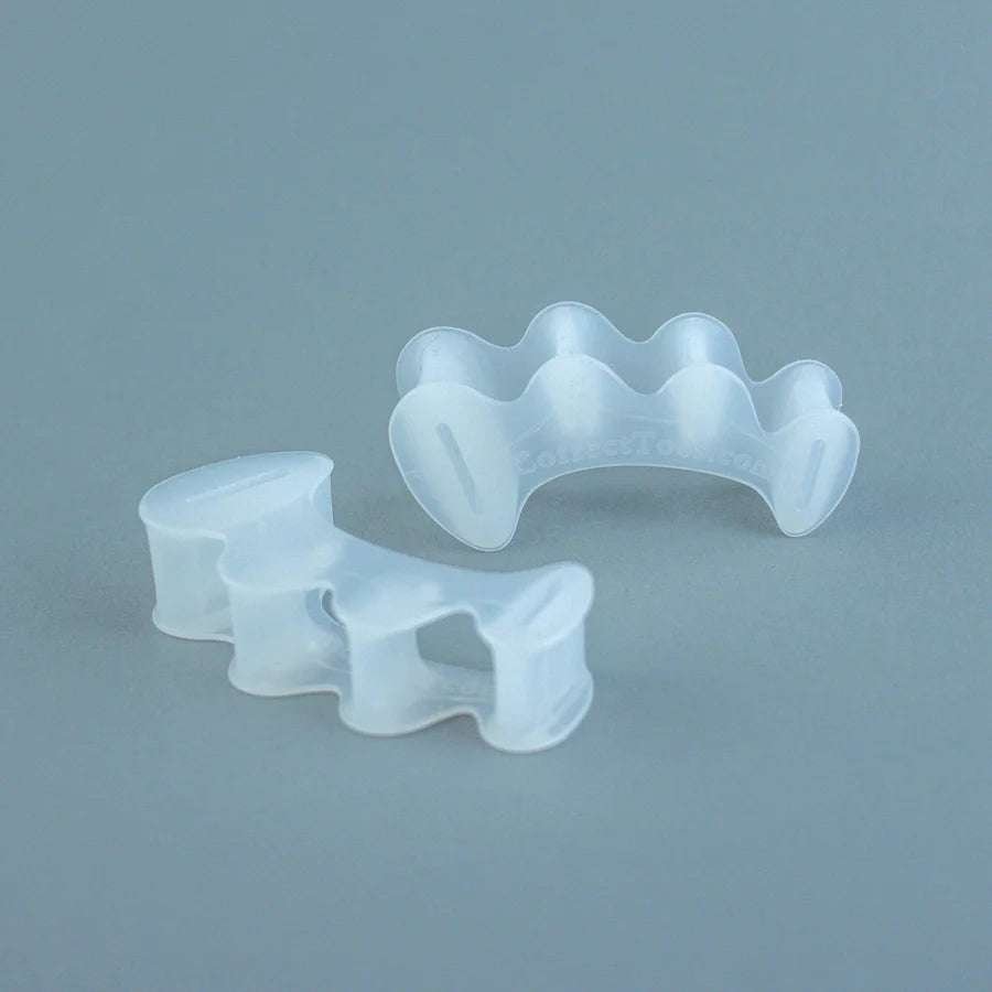 Correct Toes Original by Correct Toes in translucent white, toe spacers designed to align and strengthen feet naturally for foot health restoration