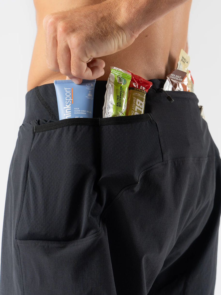 FKT 3 - Men by Rabbit in black, technical stretch trail shorts with dialed fit and multiple rear pockets for running and outdoor use