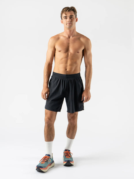 FKT 7 - Men by Rabbit in black lightweight stretch shorts with semi-relaxed fit for breathable comfort and trail running durability