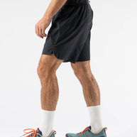 FKT 7 - Men by Rabbit in black technical stretch shorts with semi-relaxed fit, lightweight and breathable for trail running and outdoor use
