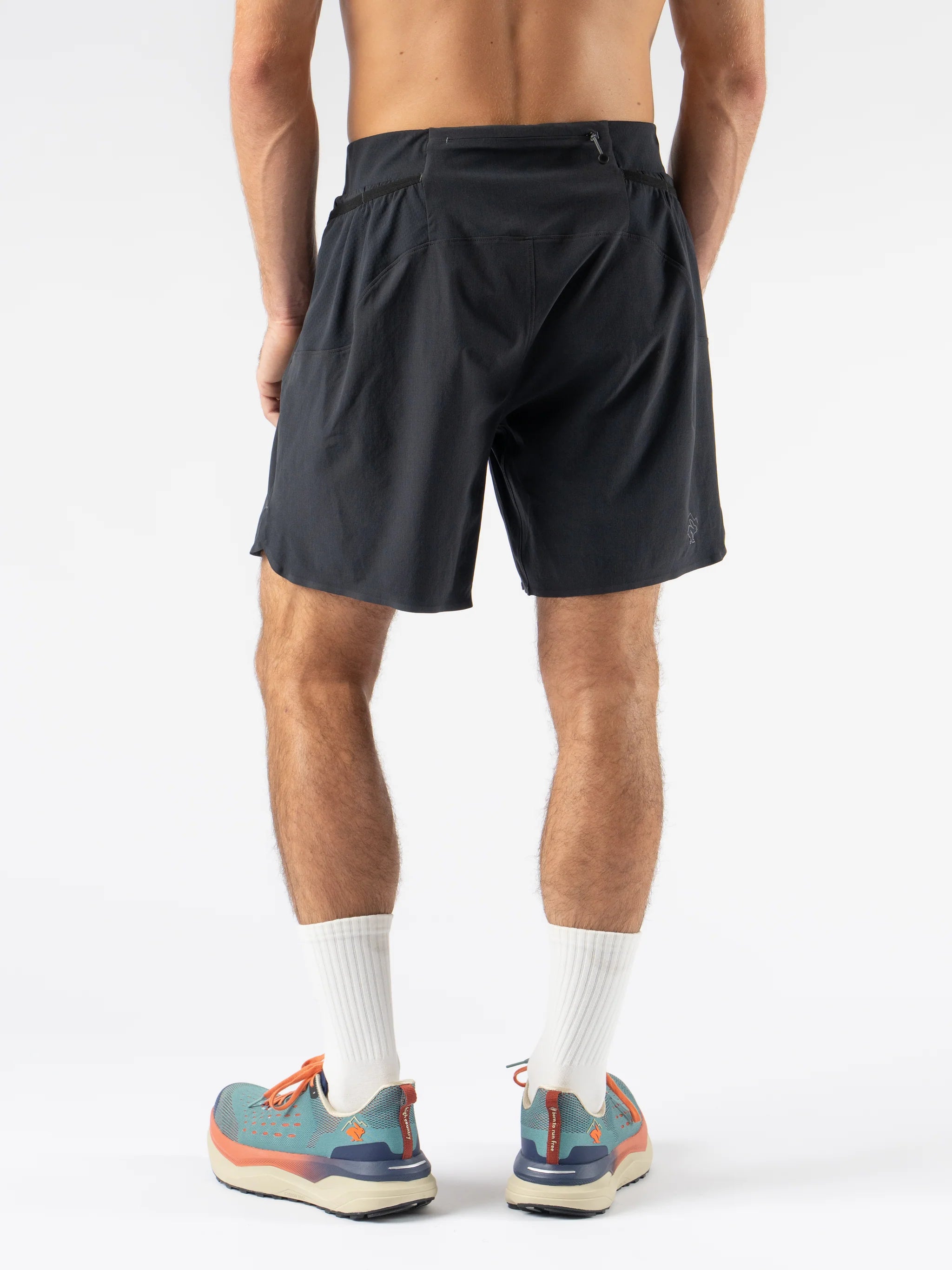 FKT 7 - Men by Rabbit in black, lightweight technical stretch fabric shorts with semi-relaxed fit for trail running and outdoor use