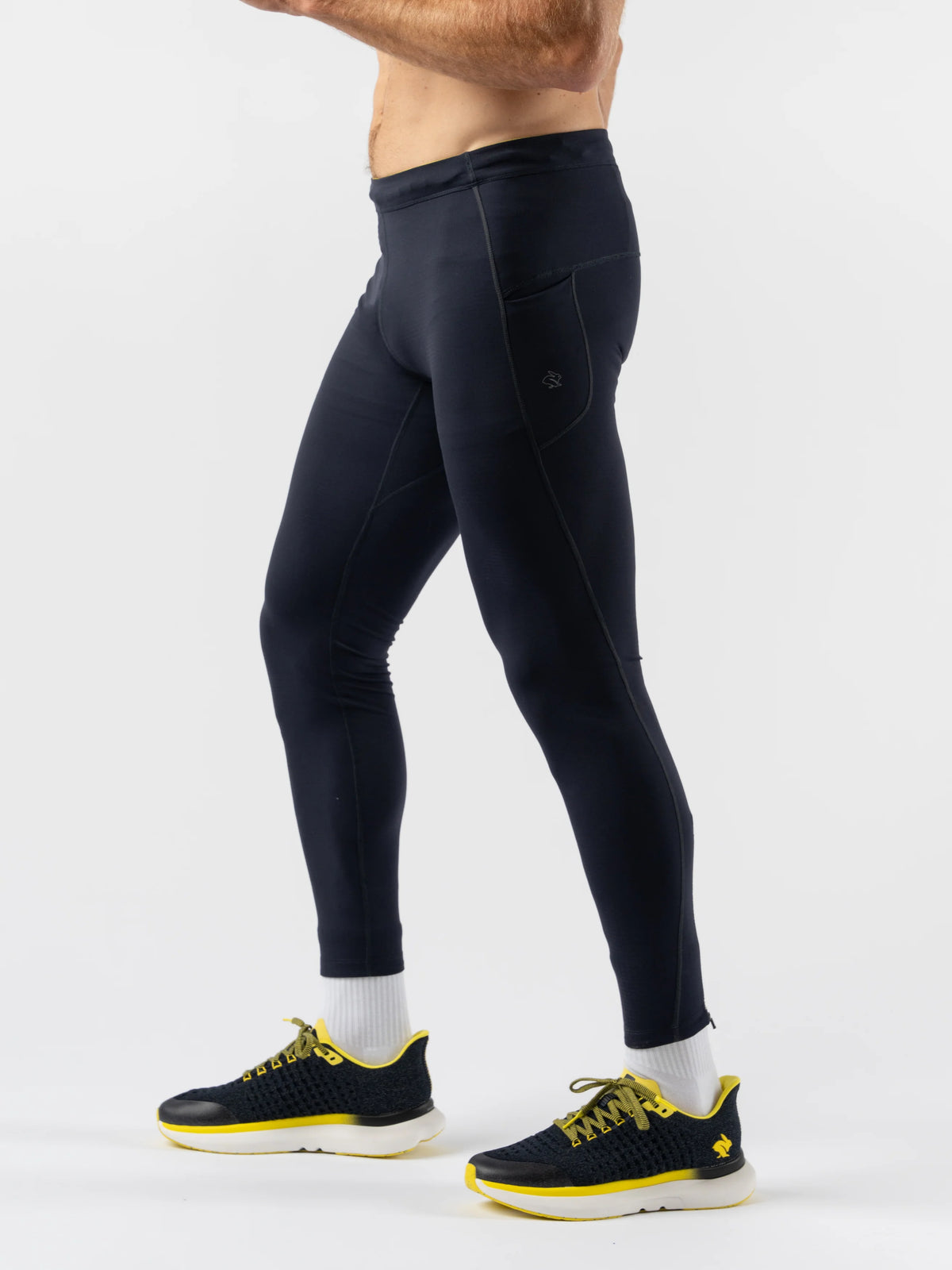 Low Light Pocket Tightz - Men by Rabbit in black with reflective print, midweight fabric, pockets, ideal for running and safety at night