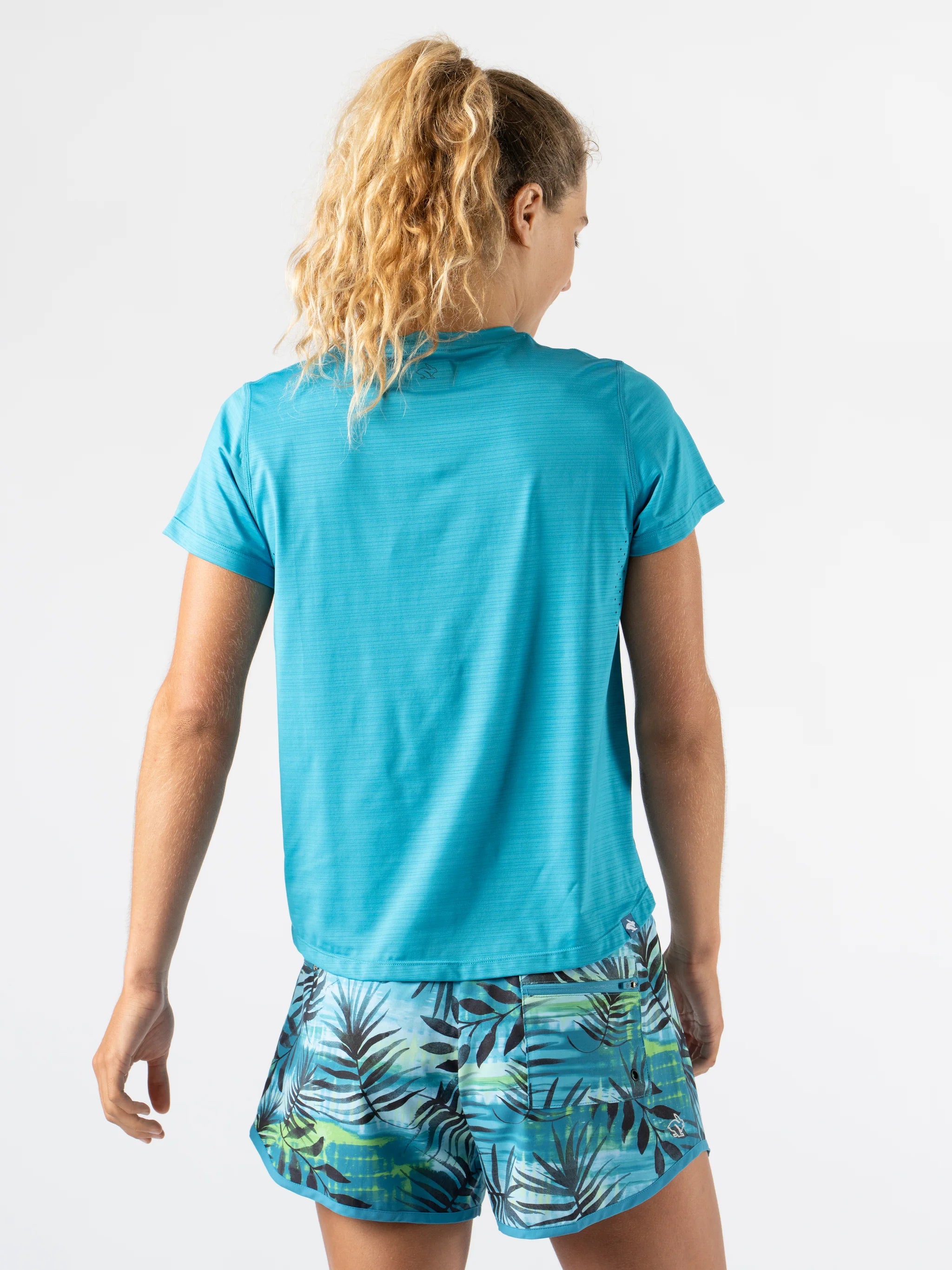 UPF Tee SS - Women by Rabbit in blue, lightweight breathable tee with UPF 50 protection and laser-cut perfs for sun safety and running