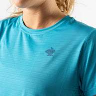 UPF Tee SS - Women by Rabbit in blue lightweight jersey with laser-cut underarm perfs, UPF 50 protection for sun safety and outdoor use